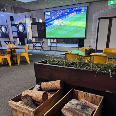 The-Club-Hotel_wood-box-and-tv_Facebook_2025_04